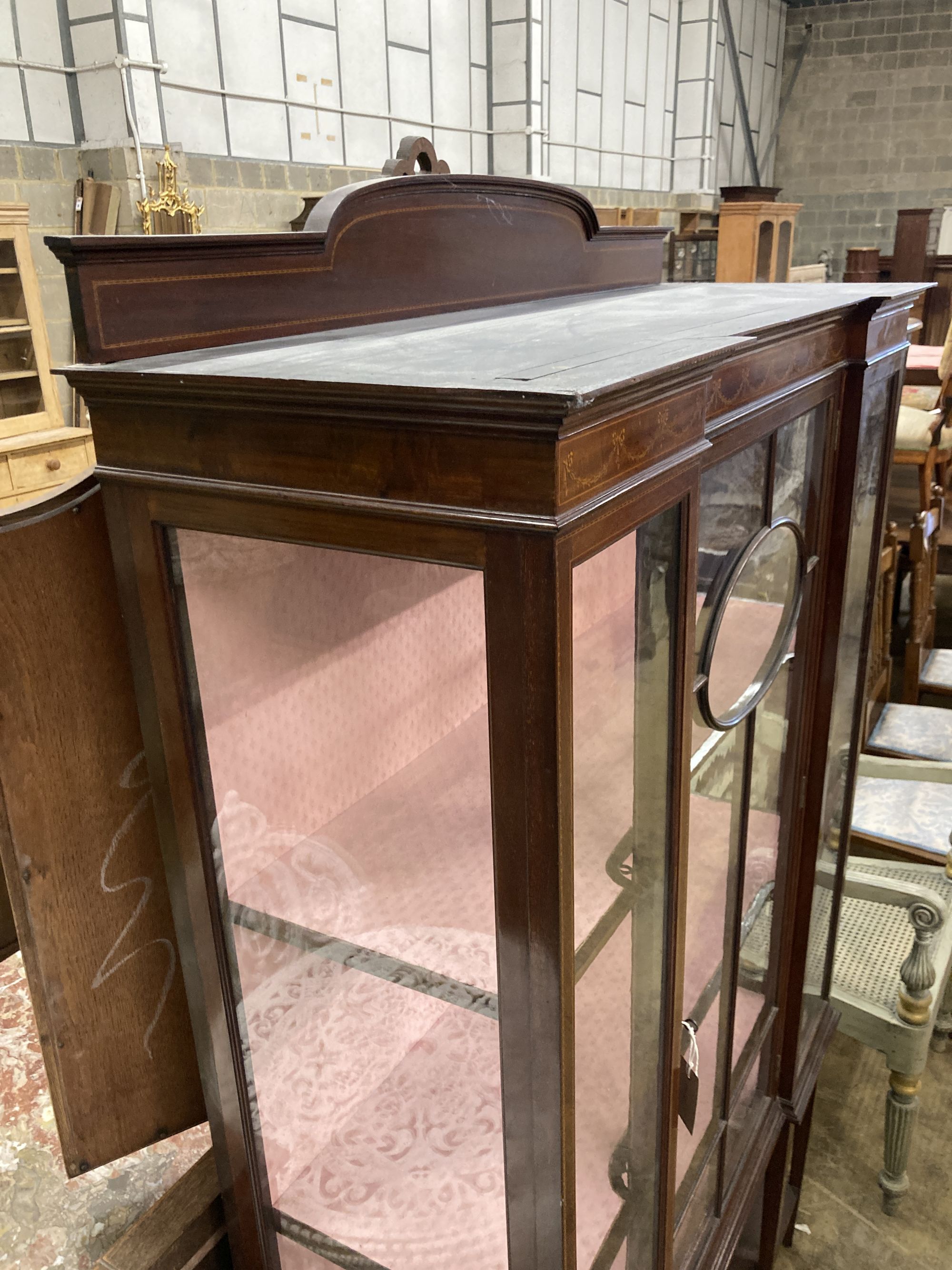 An Edwardian inlaid mahogany display cabinet, width 106cm, depth 38cm, height 180cm